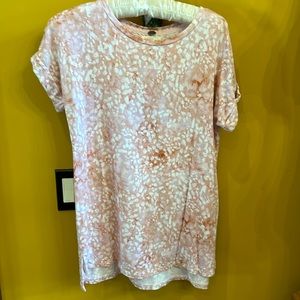 Super soft and pretty tee shirt. Stretch to it truly the softest ever.